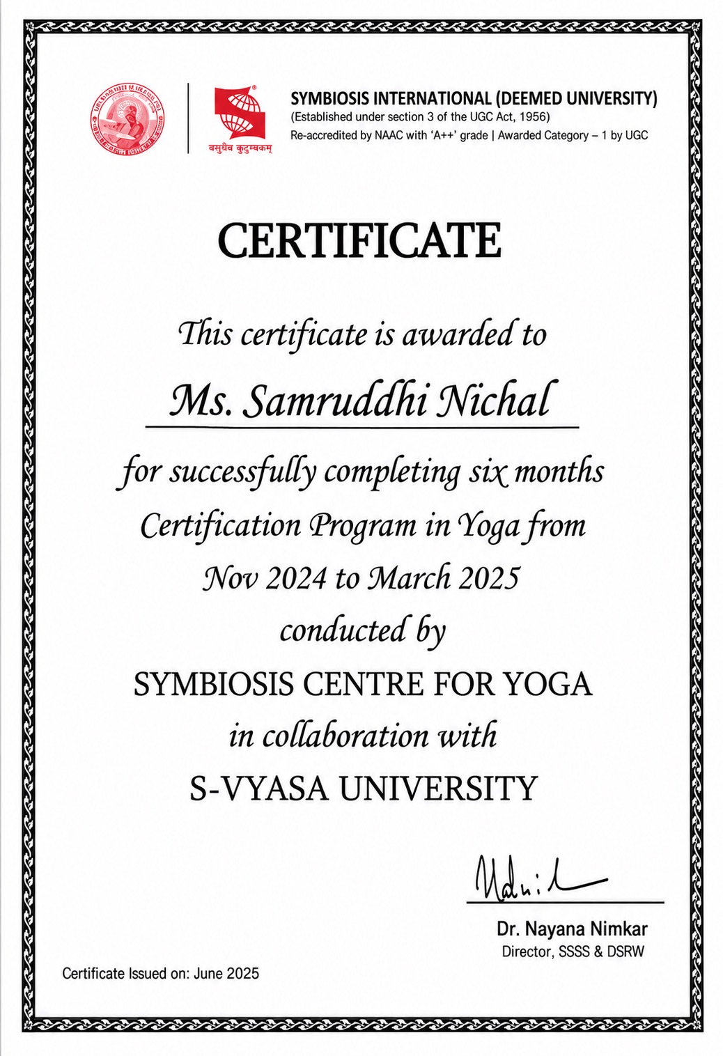 Instructor seated in a meditation pose
