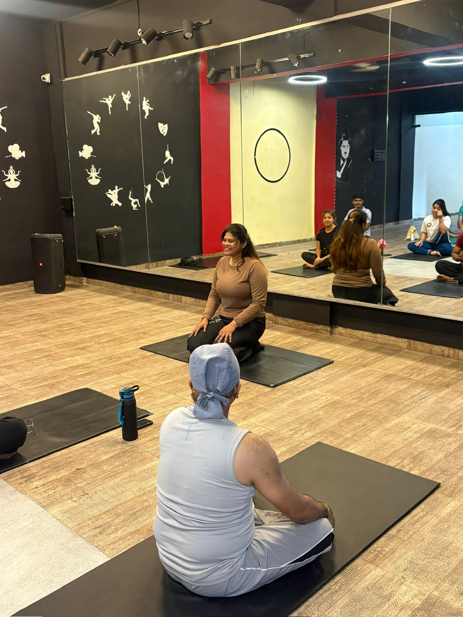 Sample group yoga class image; replace with an instructor photo